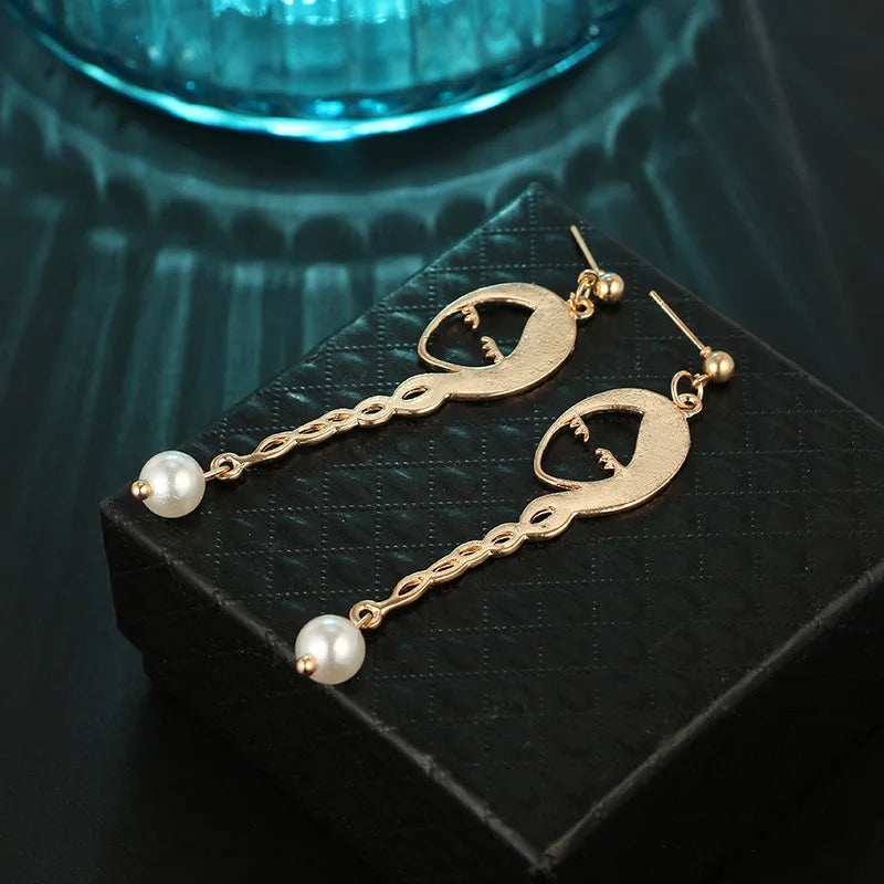 Face earrings Geometric fashion pearl female Fashion women Metal hollow out stud earrings