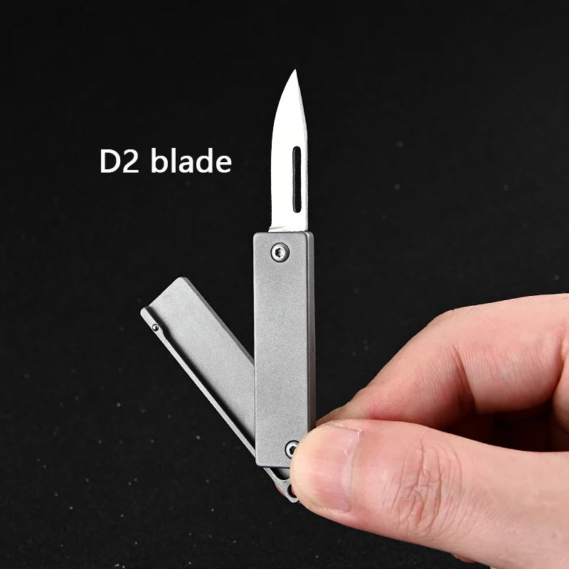 Titanium Alloy Mini Folding Knife High Hardness D2 Steel Sharp Knife With Keychain Pendant Disassembly Express Open Box EDC Tool