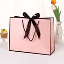 10pcs/lot High Quality Pretty Pink Gift Bag Gift Box Ornament Pajama Book Black Handle With Ribbon Paper Box Bag Kraft Packaging