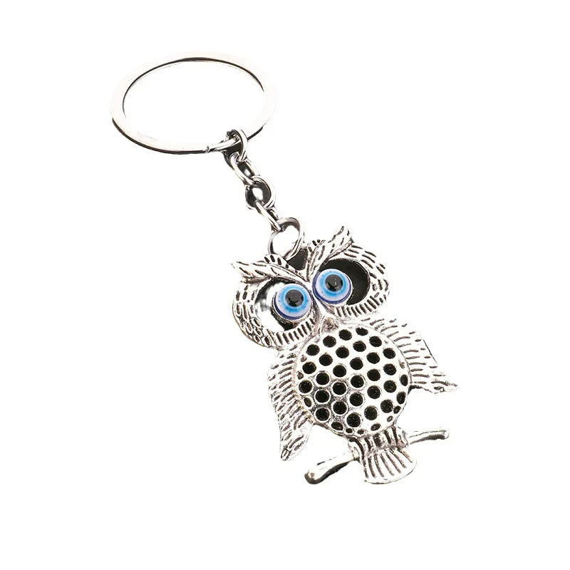 2024 Cross border Hot Selling Environmental Friendly Alloy Blue Eyed Owl Demon Eye Retro Accessories Pendant Keychain