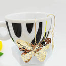 Europe and America exaggerated butterfly earring accessories brass material pressure irregular hollow butterfly earring