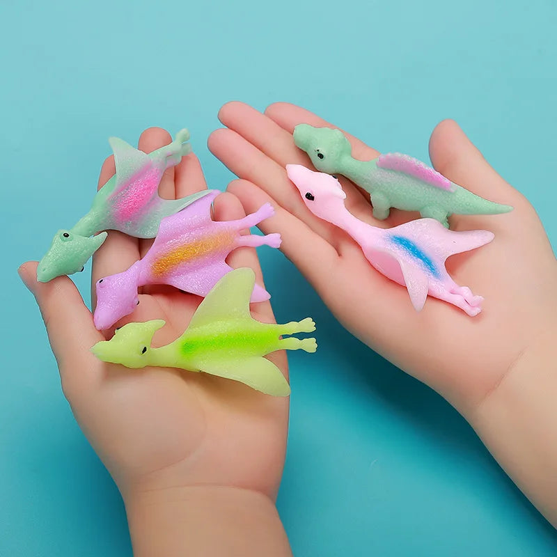 10pcs Cute Stretchable Dinosaur Finger Catapult TPR Slingshot Toys for Kids Birthday Party Favors Goodie Bag Fillers Pinata Gift