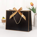 10pcs/lot High Quality Pretty Pink Gift Bag Gift Box Ornament Pajama Book Black Handle With Ribbon Paper Box Bag Kraft Packaging