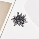 Retro edelweiss brooch. According to tradition, giving this flower to a loved one is a loyal commitment