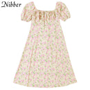 Nibber Y2k Romance francés Retro vestidos de corte bajo Mujeres Estampado floral con cordones Manga abullonada Abertura lateral Midi Vestido Vacaciones Ropa de playa