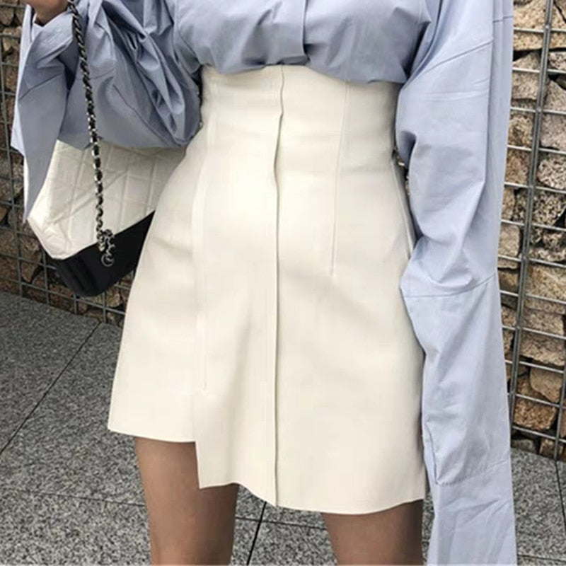 2020 neue Sommer-Frauen-Leder-Rock Pu-Leder-Schwarz-Weiß-hohe Taillen-kurze asymmetrische Rock-Frauen-Miniröcke weibliche Kleidung