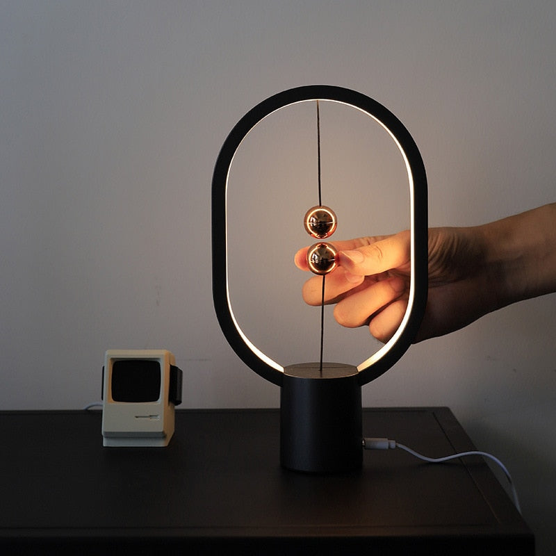 2022 Neueste USB-betriebene Mini-HENG-Ellipse-magnetischer Mid-Air-Schalter Nachtlicht-Balance LED-Tischlampe Büro-Wohnkultur