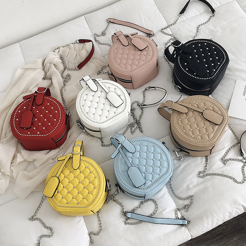 Bolso de hombro Circular con remaches de cadena a la moda para mujer, bandolera cruzada de piel sintética para mujer, bolso de mano redondo para mujer