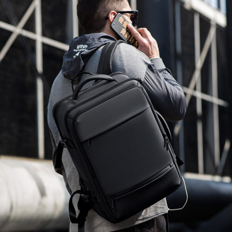 Mochila Fenruien para hombre, mochilas para ordenador portátil de 17,3 pulgadas, carga USB ampliable, mochila de viaje de gran capacidad con bolsa impermeable