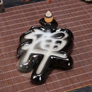 Una variedad de quemadores de incienso de flujo inverso, torre de incienso, adornos de quemador de incienso de cerámica