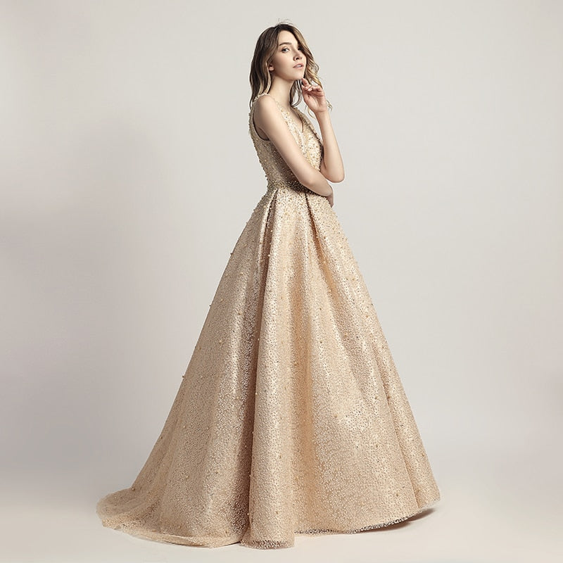 Luxus-Abendkleider lang Dubai Arabisch A-Linie Perle Backless Partykleider bodenlangen ärmellosen formalen Robe de Soiree LX442