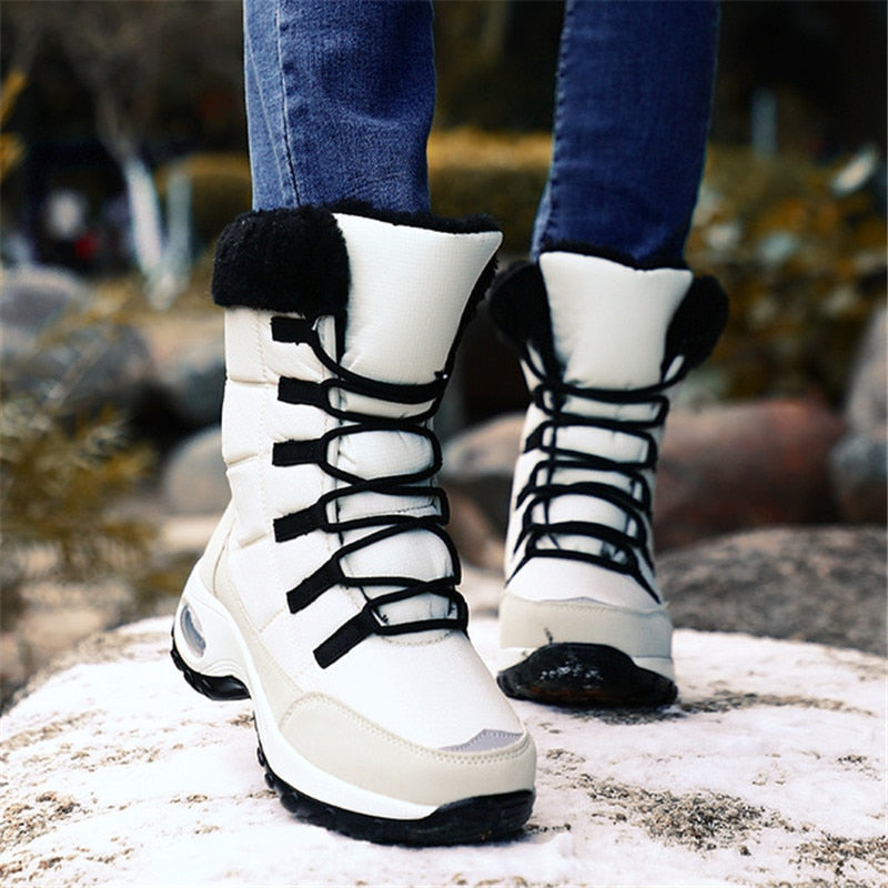 Botas de invierno impermeables de alta calidad para mujer, botas de nieve cálidas de felpa para mujer, zapatillas antideslizantes para exteriores, botines con plataforma de piel