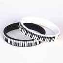1 pieza, gran oferta, pulsera de silicona con teclado de Piano impreso en blanco y negro, pulsera de notas musicales y brazaletes para amantes de la música, regalo SH081