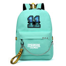 New Stranger Things Rucksack HELLFIRE Multifunktions-USB-Lade-Reise-Segeltuch-Studenten-Rucksack für Teenager Jungen Mädchen Schultasche