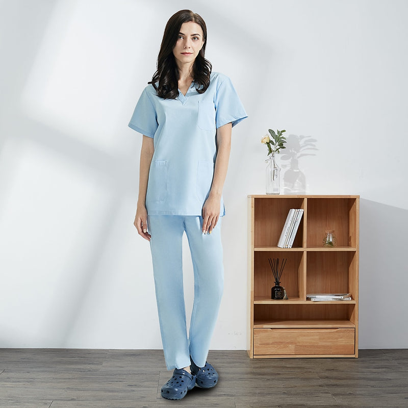 Hospital sala de operaciones negro azul enfermera Scrubs Set salón de belleza trabajo uniforme médico quirúrgico Tops pantalones mascota Doctor ropa de trabajo