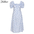 Nibber Y2k Romance francés Retro vestidos de corte bajo Mujeres Estampado floral con cordones Manga abullonada Abertura lateral Midi Vestido Vacaciones Ropa de playa