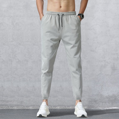 Men&#39;s Sports Pants 2021 Men&#39;s Summer Pants Men&#39;s Tie Feet Trousers Youth Loose Trousers Brand Sweatpants Men Clothing Pants Man