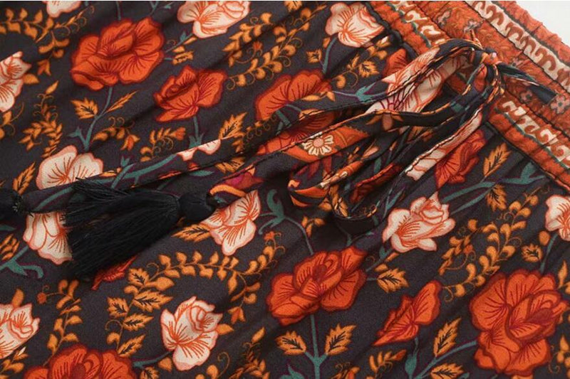 2019 Bohemian Stream Flower Print Falda larga Costura Ruched Ruffle Hem Vacaciones Mujeres Cordones Stream Cintura Swing Faldas Playa