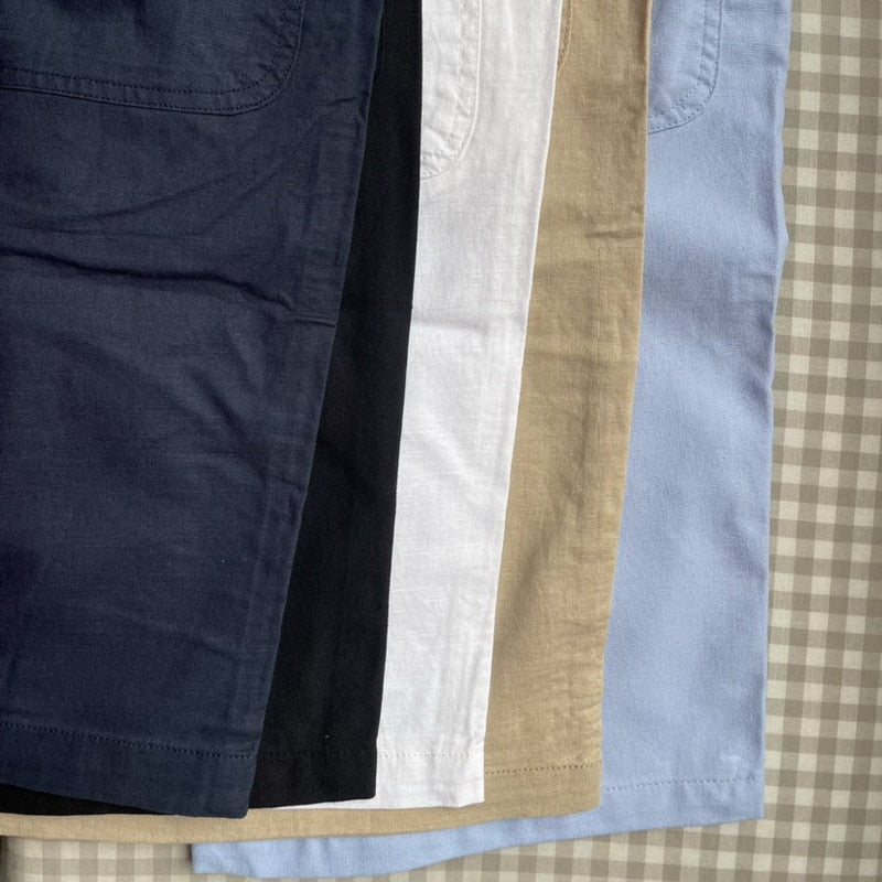 Pantalones cortos de lino nuevos de diseñador para hombre, pantalones cortos informales de playa para hombre, pantalones cortos Cargo sólidos de ocio salvaje para hombre, bermudas masculinas