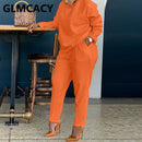 Frauen zweiteilige solide Trainingsanzüge Langarm-O-Ausschnitt-Shirt und lässige schmale Hosen im Set