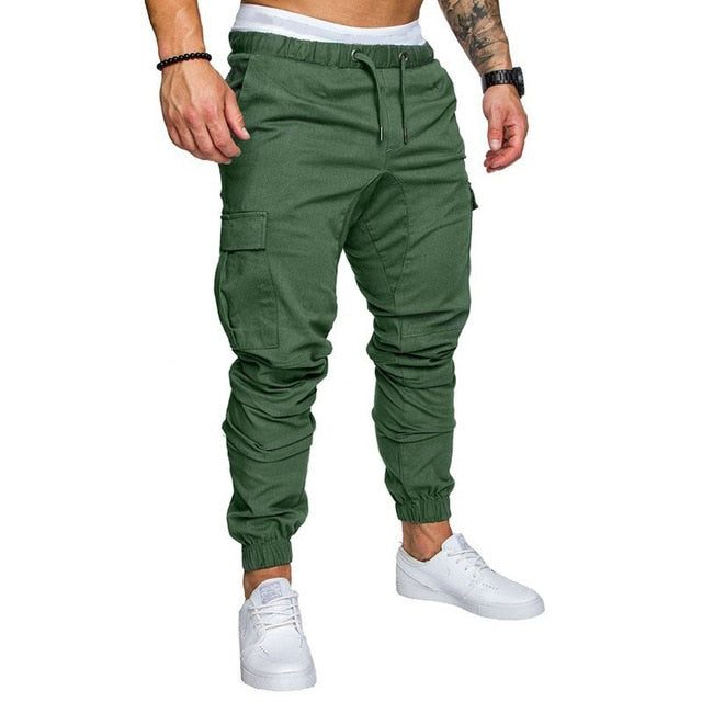 Otoño hombres pantalones Hip Hop Harem Joggers pantalones 2020 nuevos pantalones masculinos hombres Joggers sólido multibolsillo pantalones de chándal M-4XL