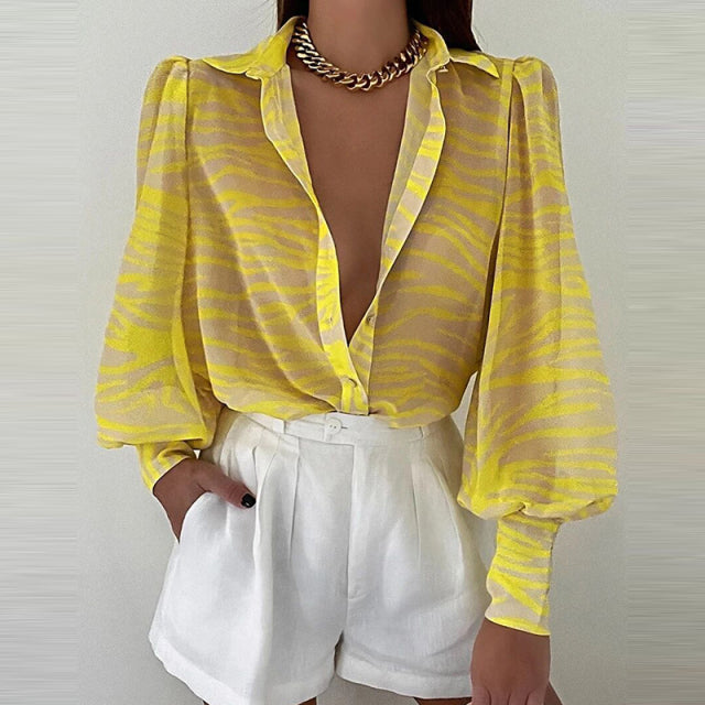 Frühlingsmode Damenhemd Laterne mit langen Ärmeln Lässige einfarbig bedruckte schmale Knöpfe mit V-Ausschnitt Bluse pendeln High Street Shirts
